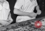 Image of wrapping lollipops United States USA, 1931, second 40 stock footage video 65675029570