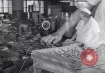 Image of wrapping lollipops United States USA, 1931, second 52 stock footage video 65675029570
