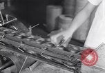 Image of wrapping lollipops United States USA, 1931, second 57 stock footage video 65675029570
