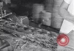 Image of wrapping lollipops United States USA, 1931, second 59 stock footage video 65675029570