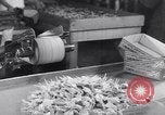 Image of wrapping lollipops United States USA, 1931, second 62 stock footage video 65675029570