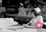 Image of making bandages United States USA, 1931, second 20 stock footage video 65675029573