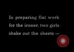 Image of machines iron bed sheets United States USA, 1931, second 1 stock footage video 65675029574