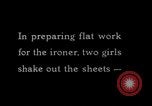 Image of machines iron bed sheets United States USA, 1931, second 3 stock footage video 65675029574