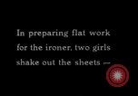 Image of machines iron bed sheets United States USA, 1931, second 7 stock footage video 65675029574