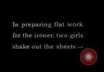 Image of machines iron bed sheets United States USA, 1931, second 8 stock footage video 65675029574