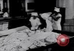 Image of machines iron bed sheets United States USA, 1931, second 14 stock footage video 65675029574