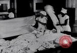 Image of machines iron bed sheets United States USA, 1931, second 15 stock footage video 65675029574