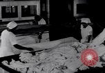 Image of machines iron bed sheets United States USA, 1931, second 17 stock footage video 65675029574