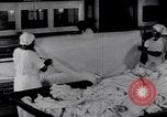 Image of machines iron bed sheets United States USA, 1931, second 18 stock footage video 65675029574