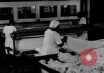 Image of machines iron bed sheets United States USA, 1931, second 21 stock footage video 65675029574