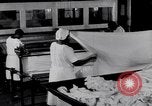 Image of machines iron bed sheets United States USA, 1931, second 22 stock footage video 65675029574
