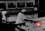 Image of machines iron bed sheets United States USA, 1931, second 25 stock footage video 65675029574