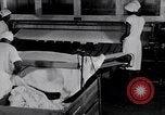 Image of machines iron bed sheets United States USA, 1931, second 32 stock footage video 65675029574