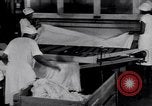 Image of machines iron bed sheets United States USA, 1931, second 34 stock footage video 65675029574