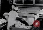 Image of machines iron bed sheets United States USA, 1931, second 35 stock footage video 65675029574
