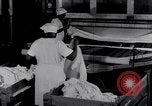 Image of machines iron bed sheets United States USA, 1931, second 36 stock footage video 65675029574