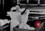 Image of machines iron bed sheets United States USA, 1931, second 37 stock footage video 65675029574