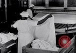 Image of machines iron bed sheets United States USA, 1931, second 38 stock footage video 65675029574