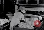 Image of machines iron bed sheets United States USA, 1931, second 40 stock footage video 65675029574
