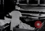 Image of machines iron bed sheets United States USA, 1931, second 41 stock footage video 65675029574