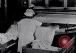 Image of machines iron bed sheets United States USA, 1931, second 43 stock footage video 65675029574