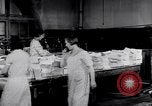Image of gather book pages United States USA, 1931, second 20 stock footage video 65675029575