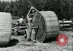 Image of laying telephone lines United States USA, 1928, second 38 stock footage video 65675029613