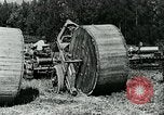 Image of laying telephone lines United States USA, 1928, second 40 stock footage video 65675029613