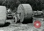 Image of laying telephone lines United States USA, 1928, second 43 stock footage video 65675029613