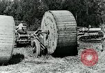Image of laying telephone lines United States USA, 1928, second 44 stock footage video 65675029613