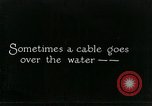 Image of underwater telephone lines United States USA, 1928, second 7 stock footage video 65675029615