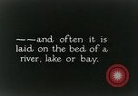 Image of underwater telephone lines United States USA, 1928, second 22 stock footage video 65675029615