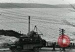 Image of underwater telephone lines United States USA, 1928, second 30 stock footage video 65675029615