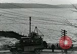 Image of underwater telephone lines United States USA, 1928, second 34 stock footage video 65675029615