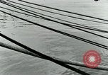 Image of underwater telephone lines United States USA, 1928, second 41 stock footage video 65675029615