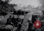 Image of British Mark IV (female) tank with hitchhikers France, 1916, second 3 stock footage video 65675029642
