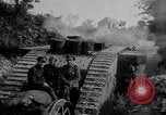Image of British Mark IV (female) tank with hitchhikers France, 1916, second 4 stock footage video 65675029642