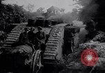 Image of British Mark IV (female) tank with hitchhikers France, 1916, second 10 stock footage video 65675029642