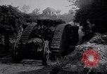 Image of British Mark IV (female) tank with hitchhikers France, 1916, second 21 stock footage video 65675029642