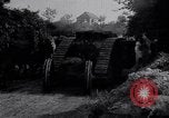 Image of British Mark IV (female) tank with hitchhikers France, 1916, second 26 stock footage video 65675029642