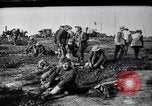 Image of rubber thigh boots France, 1917, second 25 stock footage video 65675029651