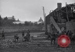 Image of Allied troops in destroyed French town during World War I France, 1918, second 21 stock footage video 65675029653