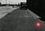 Image of Ford stake bed truck is demonstrated in operation United States USA, 1932, second 1 stock footage video 65675029688