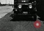 Image of Ford stake bed truck is demonstrated in operation United States USA, 1932, second 3 stock footage video 65675029688