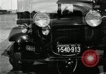 Image of Ford stake bed truck is demonstrated in operation United States USA, 1932, second 5 stock footage video 65675029688