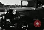 Image of Ford stake bed truck is demonstrated in operation United States USA, 1932, second 10 stock footage video 65675029688