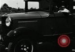 Image of Ford stake bed truck is demonstrated in operation United States USA, 1932, second 11 stock footage video 65675029688