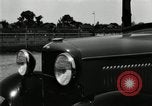 Image of Ford stake bed truck is demonstrated in operation United States USA, 1932, second 22 stock footage video 65675029688