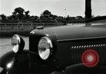 Image of Ford stake bed truck is demonstrated in operation United States USA, 1932, second 24 stock footage video 65675029688